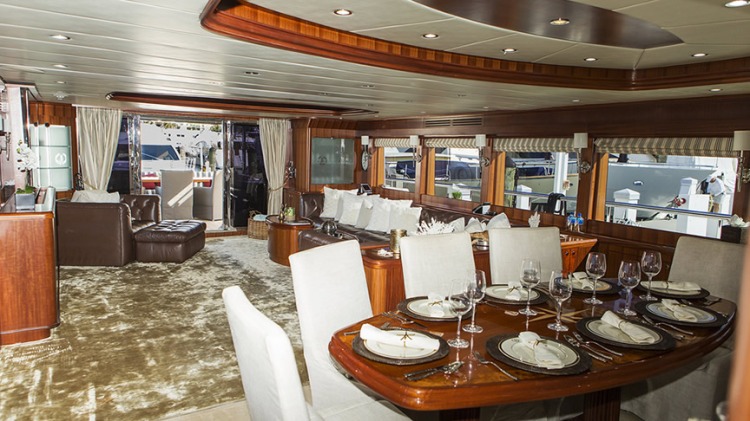 Mega Boat Johnson Yacht in Miami interior table